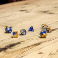 Chessex #26422 - Gemini Blue-Gold / White Polyhedral (7ct)