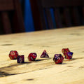 Chessex #26426 - Gemini Purple-Red / Gold Polyhedral (7ct)